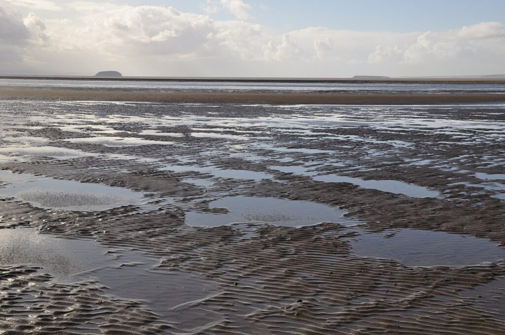 Wide sandy beach at low tide at Sand Bay, Kewstoke