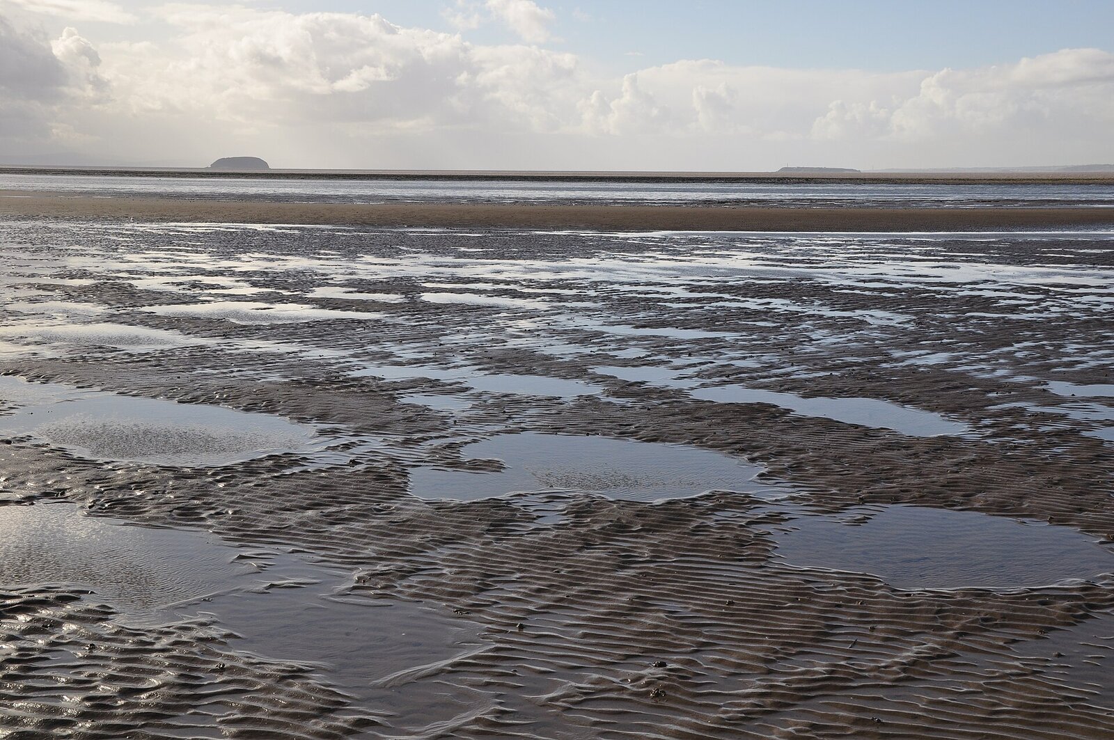 Wide sandy beach at low tide at Sand Bay, Kewstoke