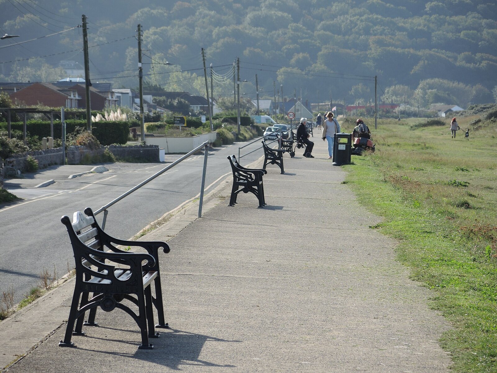 The promenade along Sand Bay, one of the dog friendly beaches closest to our cottages